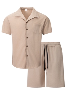 Detail of men's beige corduroy set showing ribbed texture, cuban collar and black drawstring
