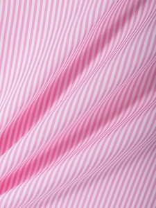 Detailed close-up showing the premium texture of pink and white striped cotton fabric