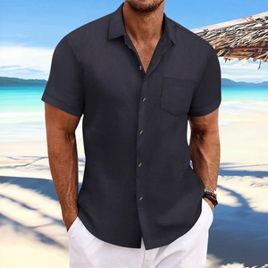 Close-up detail of dark grey vertical textured fabric on men's casual short sleeve shirt