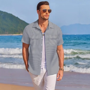 Men's summer short sleeve vertical striped casual shirt with chest pockets on beach