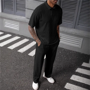 Men's black knit short sleeve Polo and trousers set with textured diamond patterns