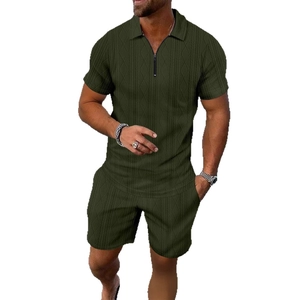 Men's dark green polo set with short sleeves and matching shorts featuring textured knit