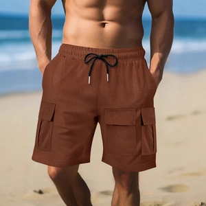 Men's brown cargo shorts with drawstring waist and flap pockets for beach wear