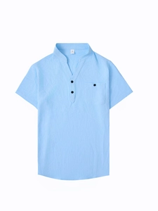 Close-up of light blue linen-textured shirt with stand collar and pocket detail