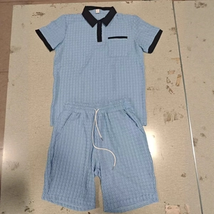 Men's summer casual two-piece polo shirt and shorts set with textured seersucker fabric