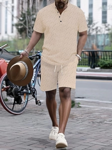 Detail of men's summer set showing polo collar and geometric textured knit pattern