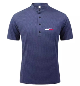 Detail of navy blue waffle knit polo shirt showing Mandarin collar and PARIS print