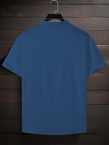 Back view of a navy blue short-sleeve cotton linen shirt with clean stitching and seams