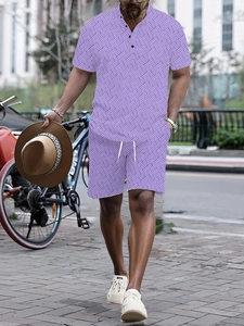 Detail of men's purple beach set showing Henley neck buttons and white drawstrings