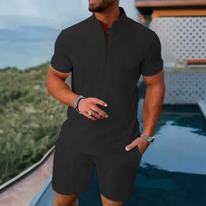 Men's summer black textured knit Henley shirt and shorts set for beach vacation style