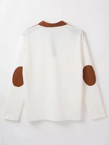 Rear view of white waffle knit sweatshirt with dark brown elbow patches and collar detail