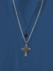 Detail of silver cross necklace with embossed rose pendant on box chain strap