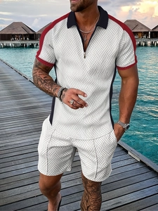Detail of men's summer polo set featuring textured geometric fabric and contrast paneling