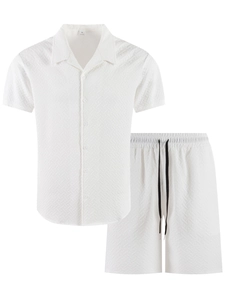 Detail of white men's short sleeve shirt and shorts set with geometric jacquard texture