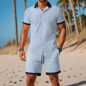 Men's light blue waffle knit summer set with shirt and shorts in tropical beach setting