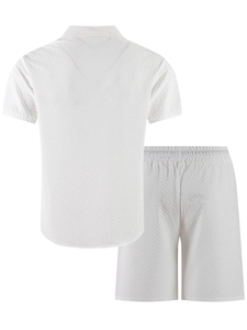 Detailed macro view of white men's summer set showing textured geometric waffle fabric