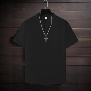 Men's minimalist black short sleeve henley shirt with cross necklace on dark wood