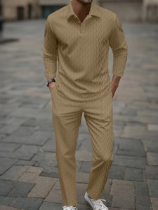 Detail of khaki men's long sleeve Polo suit featuring unique V-shaped knit texture