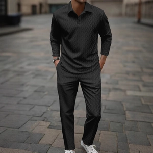 Men's black long sleeve polo shirt and pants set with textured herringbone knit fabric