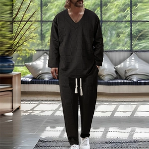 Men's black V-neck casual set with textured knit fabric and white drawstring waist