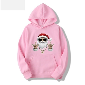 Macro detail of streetwear Santa print with sunglasses on pink cotton hoodie fabric