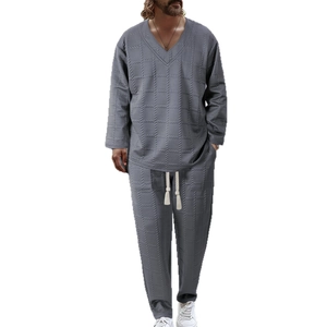 Men's casual two-piece grey lounge set with textured long sleeve V-neck top and joggers