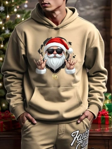 Detail view of khaki hoodie set with hip-hop Santa print and white cursive lettering
