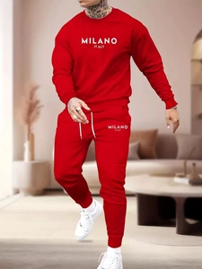 Detail of red fleece hoodie and jogger set featuring white Milano Italy screen printing
