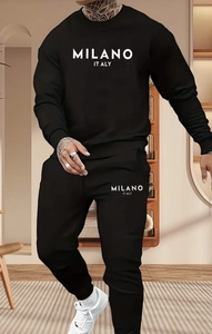 Detail of black hoodie and joggers featuring white Milano Italy printed logo set