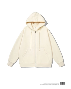 Detail of off-white zip-up hoodie featuring drawstring hood and ribbed cuffs