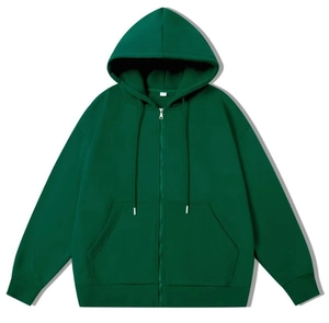 Detail of dark green zip-up hoodie showing metal zipper and kangaroo pockets