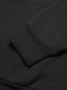 Detail of ribbed cuff on black fleece hoodie showing elastic knit fabric and stitching