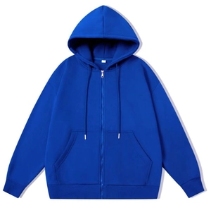 Detail view of royal blue zip-up hoodie featuring adjustable drawstring hood and large pockets