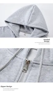 Detail of grey zip-up hoodie showing metal zipper, drawstring hood and knitted fabric