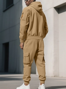Detail of khaki men's fleece hoodie and cargo pants with tactical utility pockets