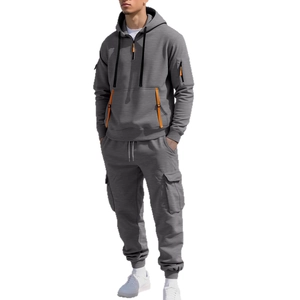 Men's grey hooded tracksuit set with orange zipper details and cargo pockets