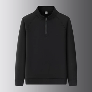 Macro detail of men's black quarter-zip sweatshirt with ribbed texture and stand collar
