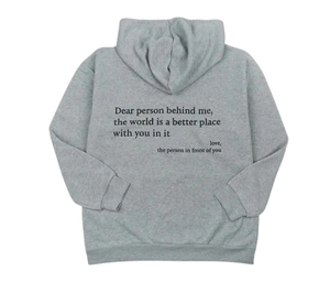 Detail of grey oversized hoodie back featuring high-quality screen-printed motivational text