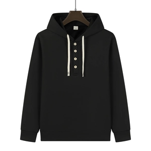 Close-up of black hoodie with henley neck design and four cream buttons on the front