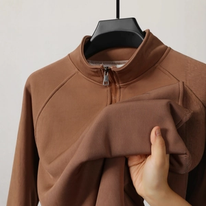 Men's coffee brown ribbed quarter-zip polo sweatshirt with standing collar and raglan sleeves