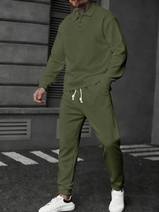 Men's olive green long sleeve polo suit with textured knit fabric and white drawstring pants
