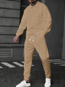 Detail showing wheat spike texture and herringbone weave on tan men's long sleeve polo set