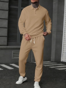 Close-up of khaki polo set featuring premium textured knit fabric and white drawstrings