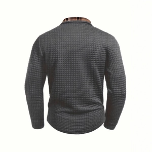 Men's dark gray long sleeve polo shirt with waffle texture and plaid collar detail