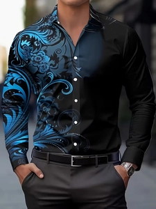 Detail of slim-fit men's shirt featuring blue floral print and black contrast panels