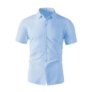 Detail view of a slim fit light blue short-sleeved men's shirt with classic collar
