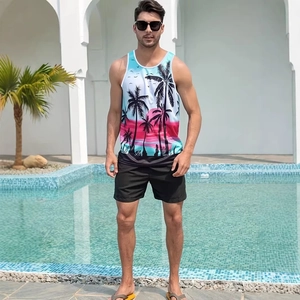 Detail of men's summer beach set featuring a tropical palm print tank top and black shorts