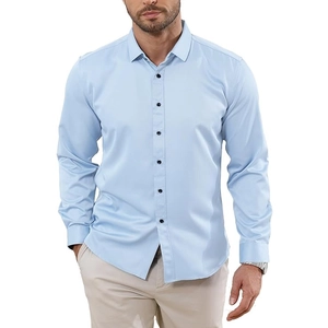 Detail of light blue men's long sleeve shirt with pointed collar and dark buttons