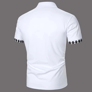 Back view of a white polo shirt with black and white checkered splicing on the sleeves