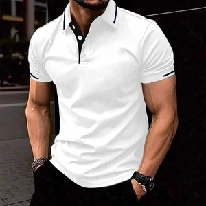 Detail shot of a white short-sleeve polo shirt featuring a navy striped collar and cuffs